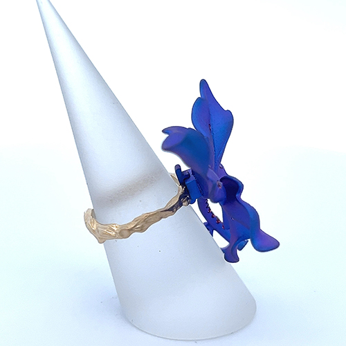One 14k  titanium purple colored  ring / pendant with pink Sapph