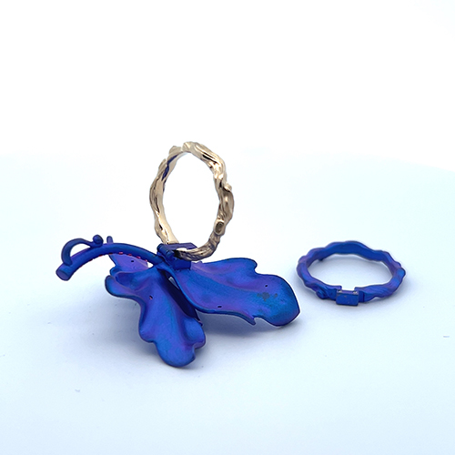 One 14k  titanium purple colored  ring / pendant with pink Sapph